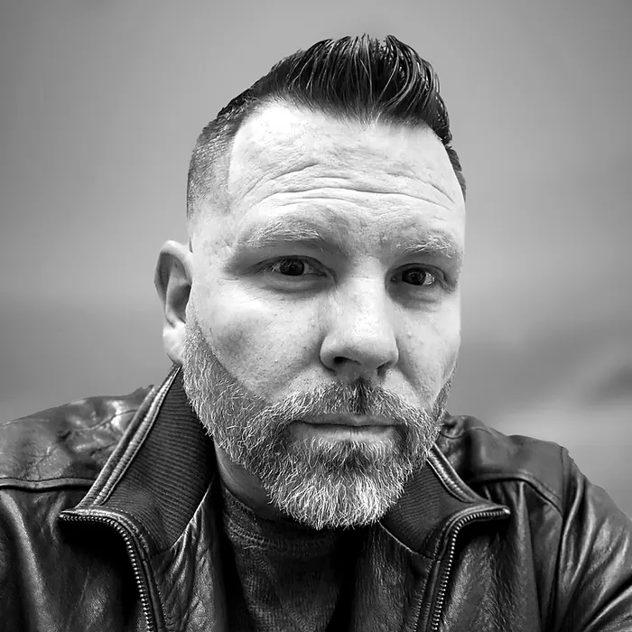 Black-and-white portrait of Craig Smith